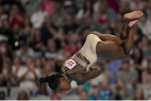 Biles: Reign & Perseverance.Biles Blazes to Gold: Gymnastics Powerhouse Reigns Supreme Yet Again